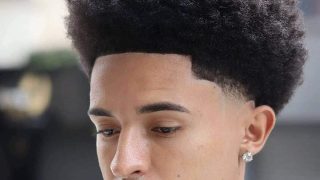 taper fade mid Afro + taper fade haircut: 15 dope styles for 2023